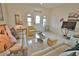 Bright living room with comfy sofas, a coffee table, and decorative accents at 110 Albatross Rd, Rotonda West, FL 33947