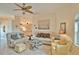 Spacious living room featuring ample seating and a relaxing atmosphere at 110 Albatross Rd, Rotonda West, FL 33947
