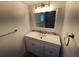 Bathroom with vanity, mirror, and tile floors at 1136 Davis Ln, Englewood, FL 34224