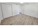 Bedroom with tile floors and double door closet at 1136 Davis Ln, Englewood, FL 34224