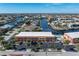 Aerial view showing building location, pool, and canal views at 1345 Mediterranean Dr # A204, Punta Gorda, FL 33950