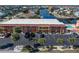 Aerial view of waterfront condo community with pool and parking at 1345 Mediterranean Dr # A204, Punta Gorda, FL 33950