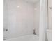 Bathroom with a bathtub and marble tile at 1345 Mediterranean Dr # A204, Punta Gorda, FL 33950