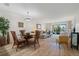 Open dining area with a glass-top table and seating at 1345 Mediterranean Dr # A204, Punta Gorda, FL 33950