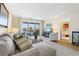 Spacious living area features water views and access to balcony at 1345 Mediterranean Dr # A204, Punta Gorda, FL 33950