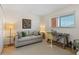 Cozy office or den with sofa and work desk at 1345 Mediterranean Dr # A204, Punta Gorda, FL 33950
