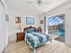 Bedroom with wood floors and pool view at 1346 Osprey Dr, Punta Gorda, FL 33950