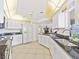Spacious kitchen with white cabinets, black granite countertops, and stainless steel appliances at 1346 Osprey Dr, Punta Gorda, FL 33950