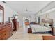 Spacious main bedroom with dresser and access to patio with water view at 1346 Osprey Dr, Punta Gorda, FL 33950