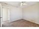 Bright bedroom with ceiling fan and carpet flooring at 1426 Natrona Dr, North Port, FL 34286