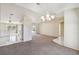 Casual dining area with views of the kitchen and Gathering room at 1426 Natrona Dr, North Port, FL 34286