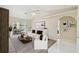 Open concept living room with access to the patio and dining area at 1426 Natrona Dr, North Port, FL 34286