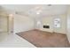Living room features vaulted ceilings, fireplace and carpet at 1426 Natrona Dr, North Port, FL 34286