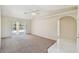 Bright living room with sliding glass doors leading to the patio at 1426 Natrona Dr, North Port, FL 34286