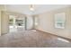 Spacious main bedroom with access to the backyard patio at 1426 Natrona Dr, North Port, FL 34286