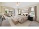 Main bedroom with sliding glass doors leading to the patio at 1426 Natrona Dr, North Port, FL 34286