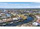 Aerial view of waterfront property with canal access and neighboring homes at 1454 Kiwi Ct, Punta Gorda, FL 33950