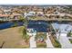 Stunning aerial view of the property and surrounding canal community at 1454 Kiwi Ct, Punta Gorda, FL 33950