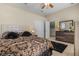 Well-lit bedroom featuring a plush bed and built-in wardrobe at 1454 Kiwi Ct, Punta Gorda, FL 33950
