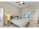 Serene bedroom with a comfy bed and access to a bathroom at 1454 Kiwi Ct, Punta Gorda, FL 33950