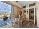 Elegant dining room with water views and access to patio at 1454 Kiwi Ct, Punta Gorda, FL 33950