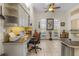Bright kitchen office space with built-in desk and plenty of storage at 1454 Kiwi Ct, Punta Gorda, FL 33950