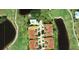 Aerial view showing condo community near golf course and water at 1640 Atares Dr # 31, Punta Gorda, FL 33950