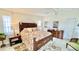 Spacious bedroom with a king-size bed and wooden furniture at 1640 Atares Dr # 31, Punta Gorda, FL 33950