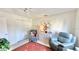 Relaxing bedroom with two armchairs and built-in wardrobe at 1640 Atares Dr # 31, Punta Gorda, FL 33950