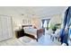Cozy bedroom with a queen-size bed and window seating area at 1640 Atares Dr # 31, Punta Gorda, FL 33950