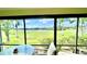 Serene lanai offering stunning golf course views at 1640 Atares Dr # 31, Punta Gorda, FL 33950