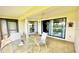 Relaxing lanai with outdoor furniture and view at 1640 Atares Dr # 31, Punta Gorda, FL 33950