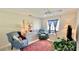 Relaxing living room with comfortable seating and a home office space at 1640 Atares Dr # 31, Punta Gorda, FL 33950