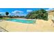 Community pool with ample deck space for lounging at 1640 Atares Dr # 31, Punta Gorda, FL 33950