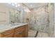 Bathroom featuring marble counters and glass shower at 1701 Casey Key Dr, Punta Gorda, FL 33950