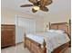 Bedroom featuring a ceiling fan and closet at 1701 Casey Key Dr, Punta Gorda, FL 33950