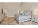 Spacious bedroom with high ceilings, neutral tones, and decorative accents creating a relaxing retreat at 1701 Casey Key Dr, Punta Gorda, FL 33950
