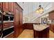 Gourmet kitchen with custom cabinetry, built-in appliances, and an open layout for easy entertaining at 1701 Casey Key Dr, Punta Gorda, FL 33950