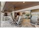 Covered patio with dining area connects to the indoor living spaces at 1701 Casey Key Dr, Punta Gorda, FL 33950