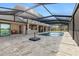 Luxury home featuring an outdoor kitchen, and pool overlooking the canal at 1701 Casey Key Dr, Punta Gorda, FL 33950