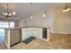 Modern kitchen with granite countertops and custom cabinets at 1890 Deborah Dr # 14, Punta Gorda, FL 33950
