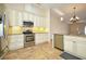 Updated kitchen with stainless steel appliances and island at 1890 Deborah Dr # 14, Punta Gorda, FL 33950