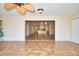 Open living area with view of kitchen and sliding doors at 1890 Deborah Dr # 14, Punta Gorda, FL 33950