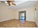 Spacious living room with tile floors and sliding glass doors at 1890 Deborah Dr # 14, Punta Gorda, FL 33950