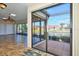 Glass sliders open to a tranquil patio overlooking a peaceful lake at 1890 Deborah Dr # 14, Punta Gorda, FL 33950
