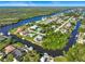 Aerial view showcases waterfront community at 18938 Ayrshire Cir, Port Charlotte, FL 33948