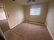 Simple bedroom with carpet and window at 18938 Ayrshire Cir, Port Charlotte, FL 33948