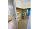 Shelved closet with mirrored doors and extra storage at 18938 Ayrshire Cir, Port Charlotte, FL 33948