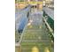 Wooden walkway leads to the canal at 18938 Ayrshire Cir, Port Charlotte, FL 33948