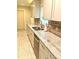Modern kitchen with granite countertops and stainless steel appliances at 18938 Ayrshire Cir, Port Charlotte, FL 33948